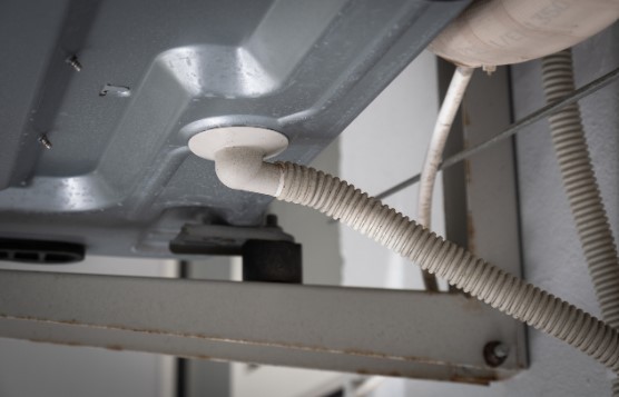 Parts of an AC system: drain line and pan