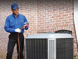 ARS Technician performing HVAC maintenance on residential system.