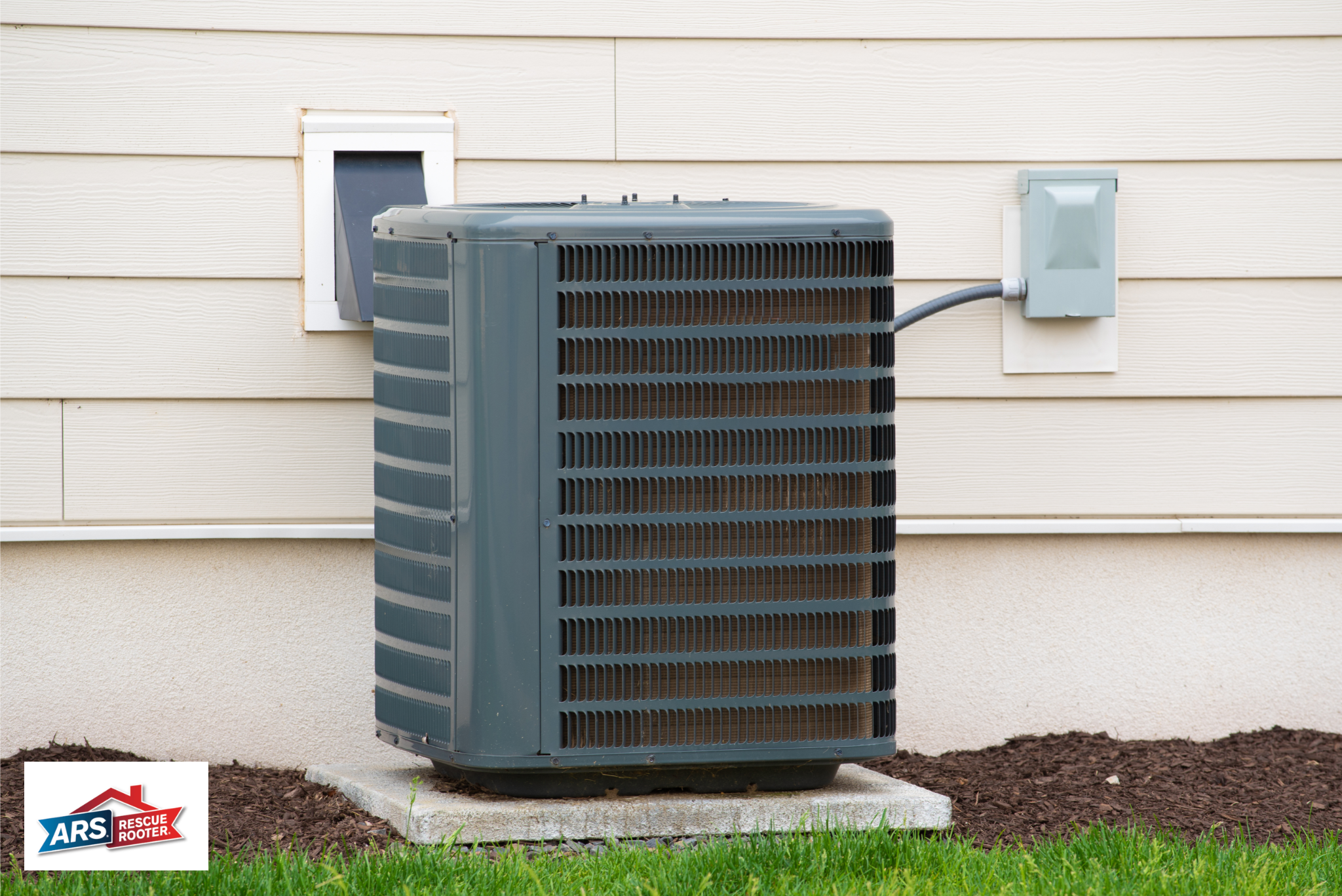 Newly installed HVAC system next to an older home outside.